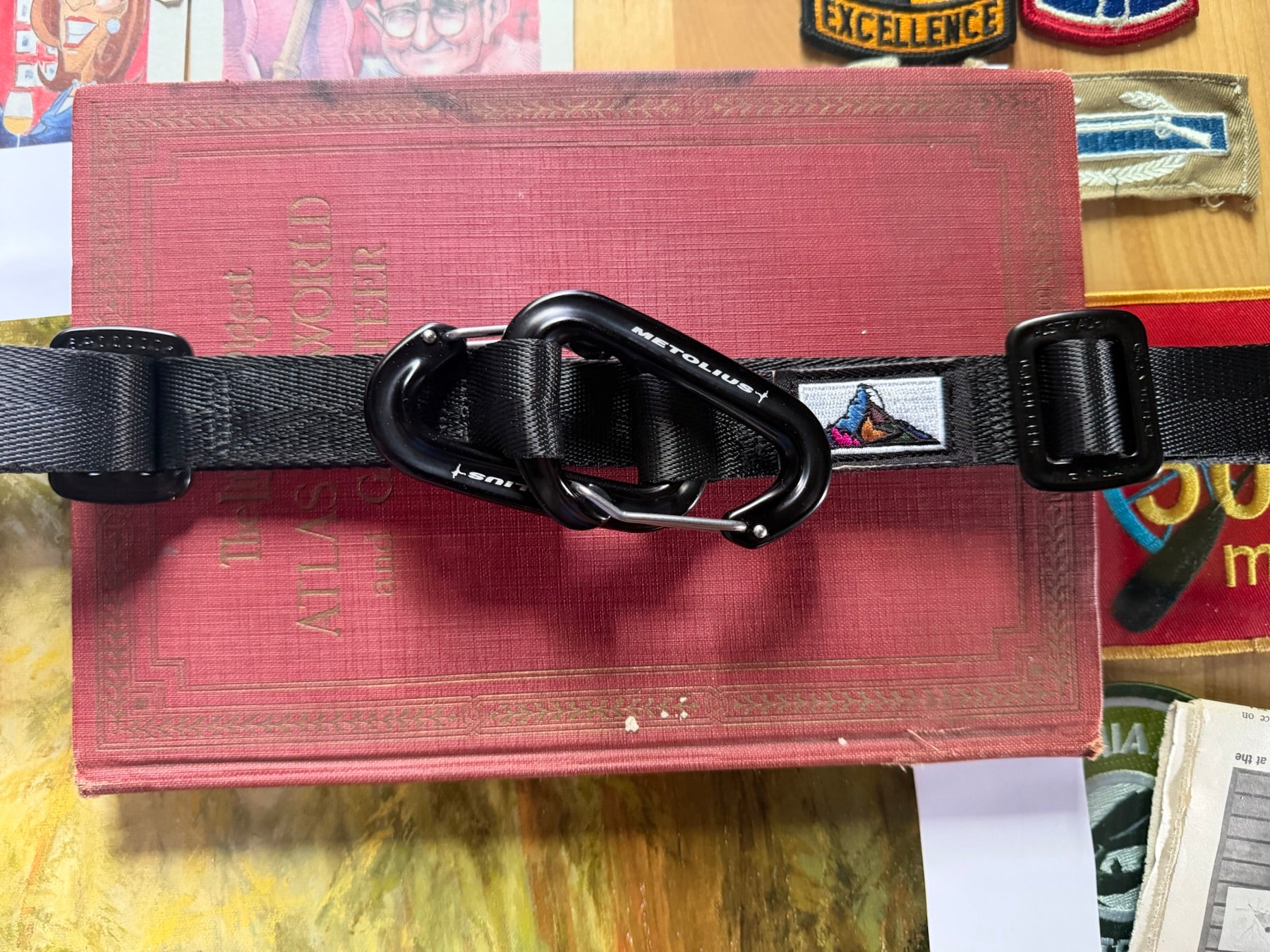 Finished black SnapSling showing its hardware and webbing